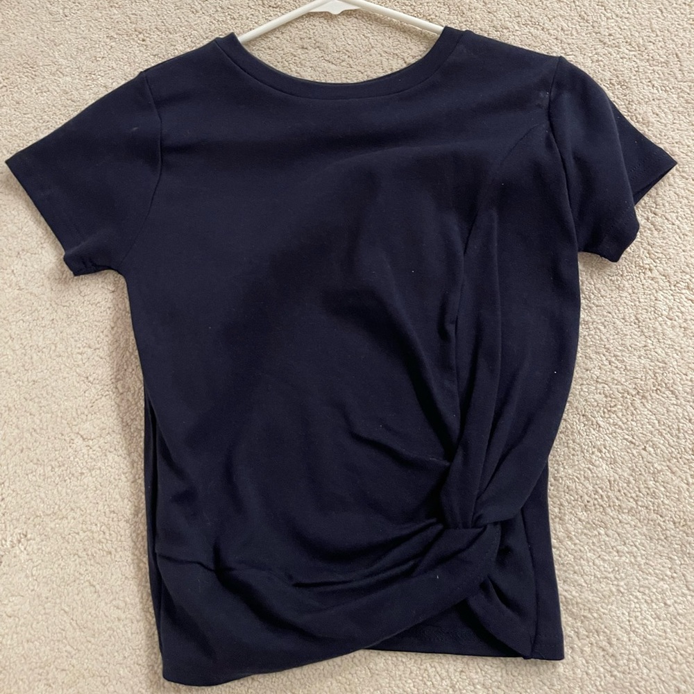Never worn, new without tags. Dark blue tee.